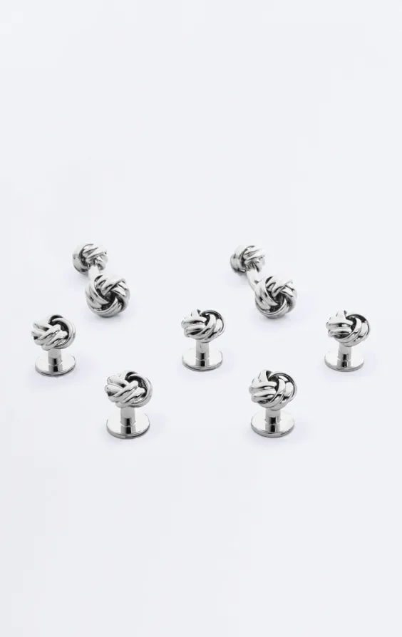 Zilverkleurige knoop stud en manchetknoop set