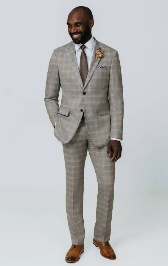 Taupe geruit pak met piek revers - photo 1 Taupe geruit pak met piek revers - photo 1