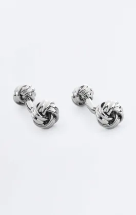 Zilverkleurige knoop stud en manchetknoop set