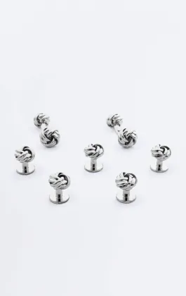Zilverkleurige knoop stud en manchetknoop set