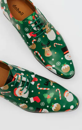 Groene schoenen met 'Santa & Friends' patroon