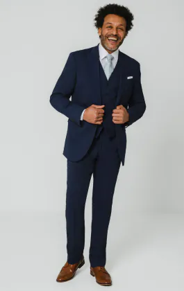 Blauw kostuum met piek revers
