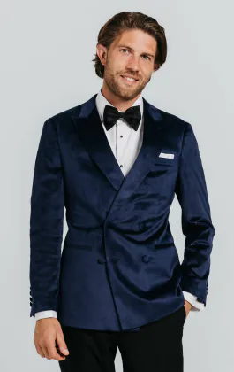 Marineblauw fluwelen double breasted smoking met zwart pantalon