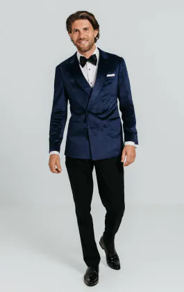 Marineblauw fluwelen double breasted smoking met zwart pantalon